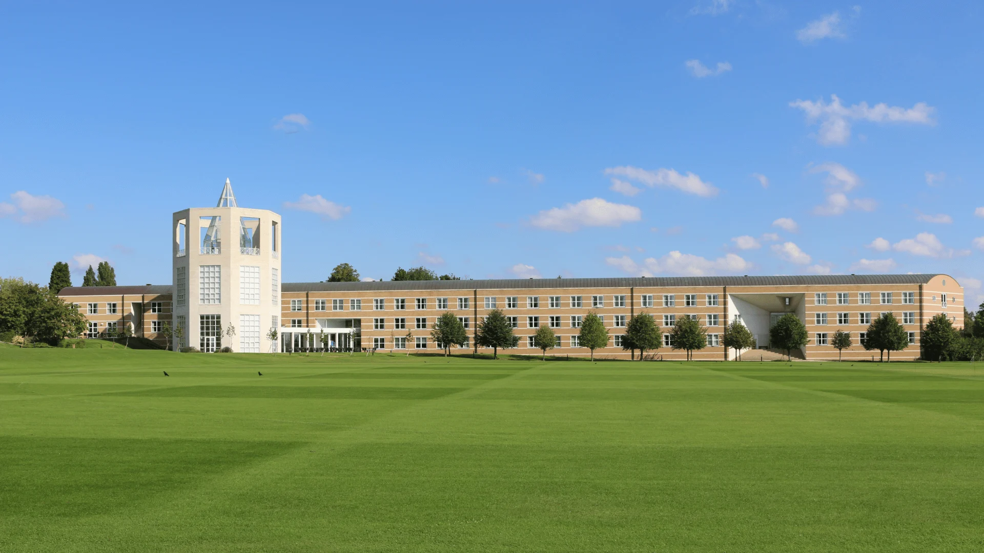 The Møller Institute at Churchill College, viewed across its lawns